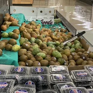 Mold on the berries and the way the pears and cactus fruit are all scattered damaged and some of it rotting