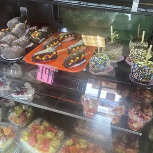 Caramel apples, fruit cups, cake