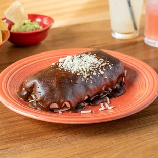 a plate of mexican food on a table