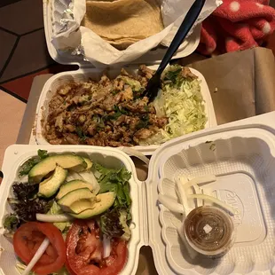 Chicken burrito bowl and side salad