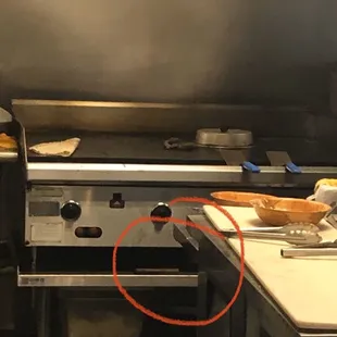 Spatula used to scrape the grill... dropped on floor and not washed