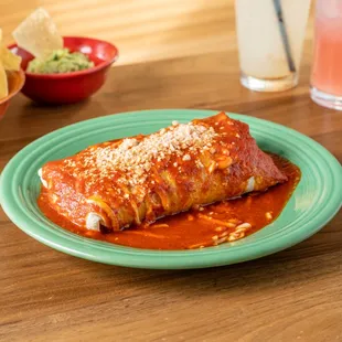 a plate of enchiladas and chips