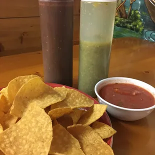 Chips &amp; Salsa do have a price but I am glad we ordered them! The three salsas were amazing! Green runs rather hot FYI.