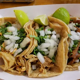 Left to right: pollo, carnitas, al pastor