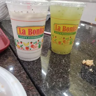 Agua fresca, horchata on left cucumber on the right.