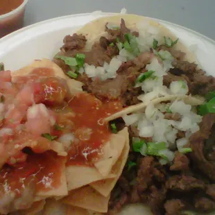 $1.25 Carne Asada tacos. Free side of chips and beans!