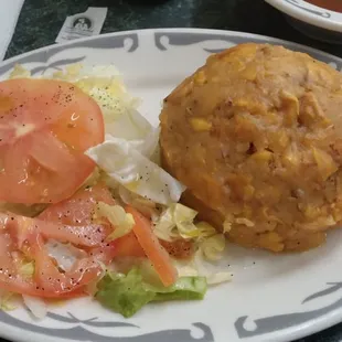 Plain Mofongo with salad, rice and beans. By far the most moist mofongo I&apos;ve had. Made to order so it can take a bit.