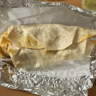 Breakfast burrito with chorizo and eggs.
