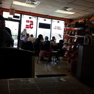 Dining room, with 3 small 2 peron table on the other side of this area