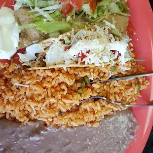 Combo Dinner (1 Enchilada, 1 Taco, 1 Tamale) served with rice and beans $10.99 loved the rice and beans,  fresh and defiantly not from a can