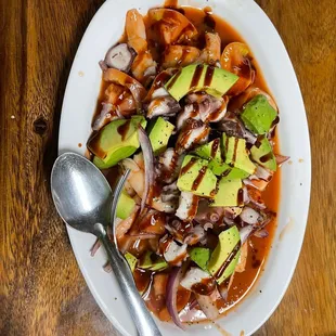 a plate of food on a wooden table