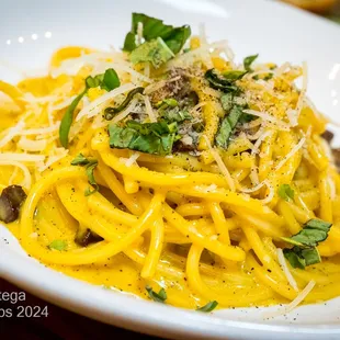 CARBONARA Bucatini, Guanciale, Garlic, Egg Yolk, Parmesan, Pecorino, Black Pepper, Basil