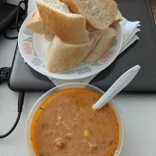 Chicken tortilla soup minus tortillas with enough bread to take care of three bowls.