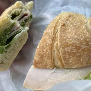 Smoked turkey on croissant no mustard, tomato add pesto (they charge $.85 to add pesto)