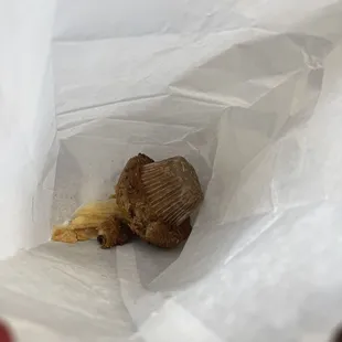 shitty muffin and strudel with a few bites out of it