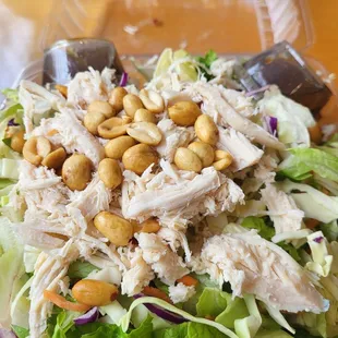 a salad in a plastic container