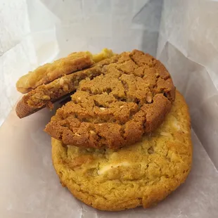 two cookies on a piece of wax paper