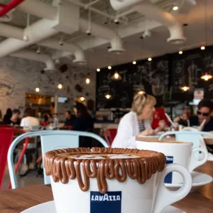 a cup of coffee on a saucer