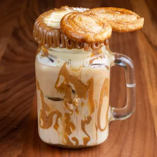 Iced Dulccino gourmet coffee. Served with an elephant ear cookie.