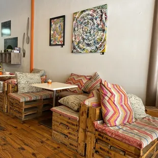 a restaurant with wooden furniture