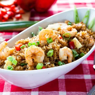 a bowl of fried rice with shrimp
