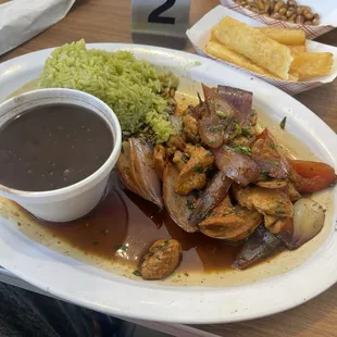 Chicken stir fry with cilantro rice and black beans