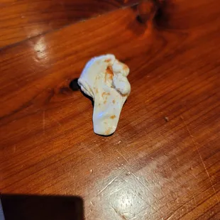 a piece of food left on the table