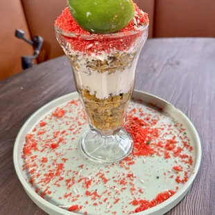 a dessert with a lime on top