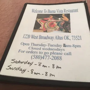 New hours written on the menu.