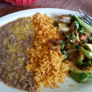 Sautéed shrimp with rice and beans