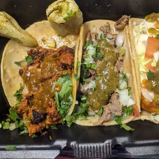 Pastor, carne asada and fish tacos