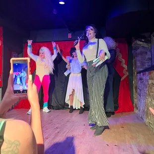 a group of people on stage