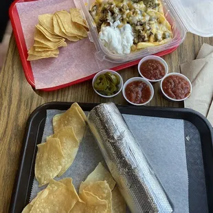 Carne Asada Burrito (bottom) and Carne Asada Fries (top)