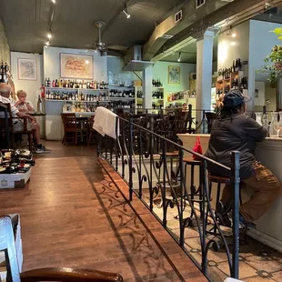 people sitting at a bar