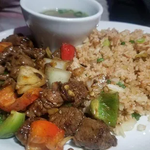 Shaken Beef... with a bed of tomato rice!! Amazing flavors, tender beef. Must order!!!