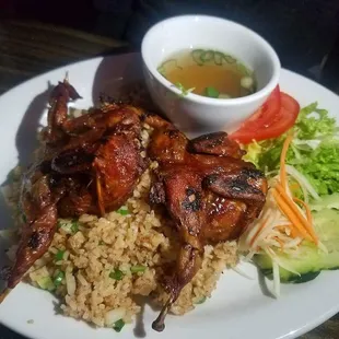 Roasted Quail with tomato rice... mmmm .. quail cooked to perfection