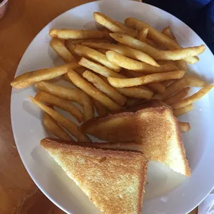  plate of french fries and a grilled cheese sandwich