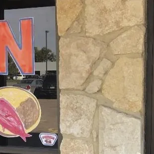 the open sign in the window