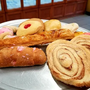 a variety of pastries on a tray