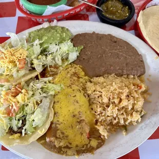 Thursday #1 Lunch Special: 2 Cheese Enchilada, 2 Beef Puffy Tacos, rice &amp; beans ..$7.99