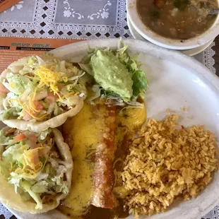 #1 Plate, 2 Cheese Enchilada, 2 Chicken Puffy Tacos, guacamole, rice &amp; charro beans.