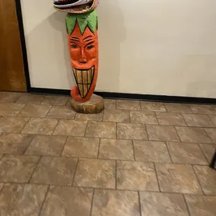 a ceramic tiki