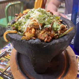 Molcajete with steak and chicken