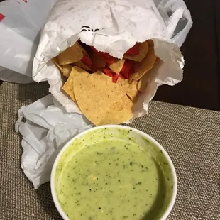 $7 bucks for chips and salsa verde togo. Remember, this is free when u dine in.