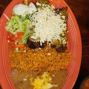 Fried tamales, rice, and beans.