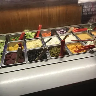 a variety of salads and condiments