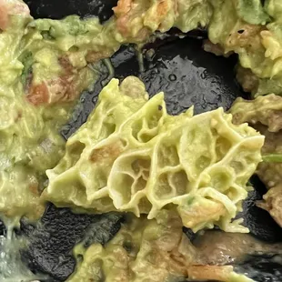 A piece of RAW TRIPE mixed in the guacamole