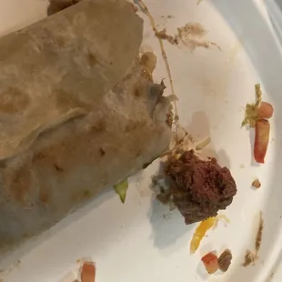 a partially eaten burrito