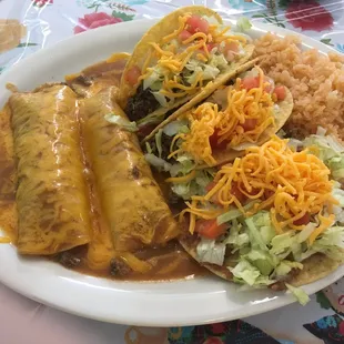 #22 on the menu / 2 beef enchiladas/ 1 chalupa / 2 tacos and Spanish rice!