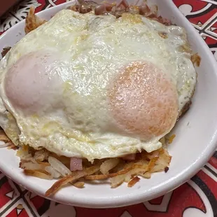 Meat Lover's Skillet $10.99 Crispy bacon, tasty sausage, tender ham, and Cheddar cheese.